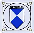 Emblem used to mark protected buildings and other structures in Germany.