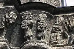 Portal relief possibly depicting nyckelharpa players, c. 1350, Källunge Church, Gotland, Sweden.