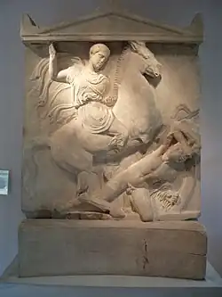 Marble sculpture, rectangular with a triangular top: Dexileos is depicted on horseback, spearing a nude enemy.