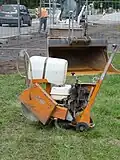 Concrete floor disc cutter with water tank for cooling, not applicable to an abrasive saw