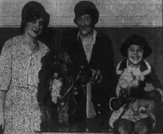 Belais (middle) in 1932 awarding hero dogs in New York