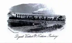 A postcard of a steam train crossing a brick viaduct from a distance. The postcard is a black and white drawing with the words "Digswell Viaduct, Gt. Northern Railway" written underneath.