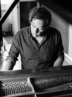 Dirk Reichardt at the piano in his studio