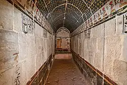 The two proscriptions have left the corridor of the upper Anubis shrine with a solitary figure, that of Thutmose I at the far end