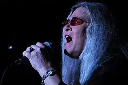 Godchaux singing in 2009
