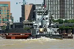 Towboat Donna York pushing barges of coal up the Ohio River at Louisville, Kentucky, United States
