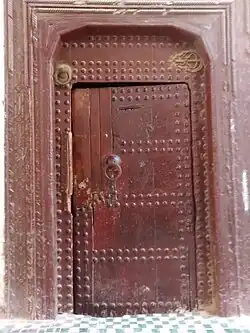 A door in Fez, Morocco with two knockers. Traditionally, one was used by women and the other by men (see top left).