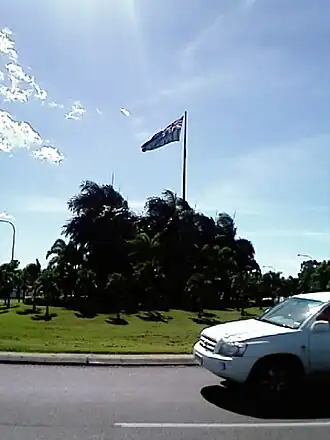 Flag at roundabout on the Bruce Highway at the entrance to Douglas