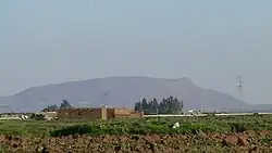 The "Green Mountain", the only visible hill, east of the region