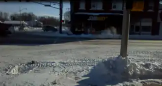 Downtown Greentown in the winter. Showing the light, and the corner which Subway sits.