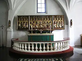Interior view of the church with the altarpiece from 1512