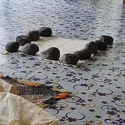 The fabric is laid out to dry before it is decorated.