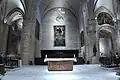 The main altar. The Assumption canvas is visible on the apse wall, with the cross above