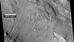 Gullies and massive flow of material, as seen by HiRISE under HiWish program. Gullies are enlarged in next image. Location is Bamberg crater
