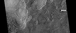 Scalloped ground, as seen by HiRISE under HiWish program.