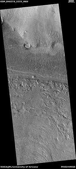 Part of lobate debris apron, as seen by HiRISE under HiWish program This lobate debris apron surrounds a mesa. Location is the Ismenius Lacus quadrangle.