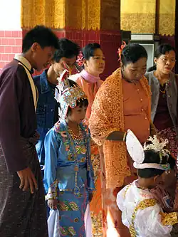Image 41An ear-piercing ceremony at Mahamuni Buddha in Mandalay (from Culture of Myanmar)