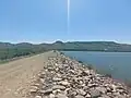 Earthen dam and reservoir