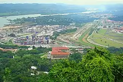 View of the city showing the Panama Canal and the headquarters building