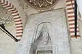 Entrance portal to the prayer hall, with muqarnas stonework