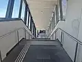 Stairs leading to Nepean Highway and Platform 1 from the undercover pedestrian overpass, December 2024