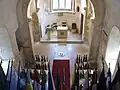 Inside of the church with the Robert Schuman grave and all the flags of the European Union countries