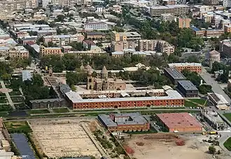An aerial view of the cathedral and the Mother See complex surrounding it from a plane