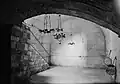 Vaulted space inside the subterranean chamber of Barclay's Gate, view towards east, c. 1940