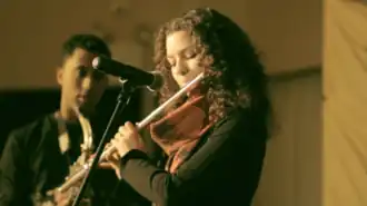 Pinderhughes performing with Braxton Cook at the National Black Theatre in Harlem, 2014