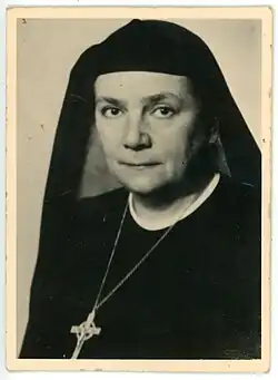 Portrait of Else Mathilde Mayer wearing the internal habit of the Order of the Redeemer, with a veil covering her hair and a cross on her chest. She is shown in formal, composed pose. The photograph is in black and white; the photographer is unknown.