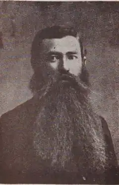 A man with long bushy beard