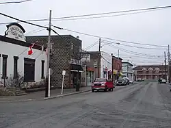 Main street in Englehart, with the ONR train station visible at the end of the street.