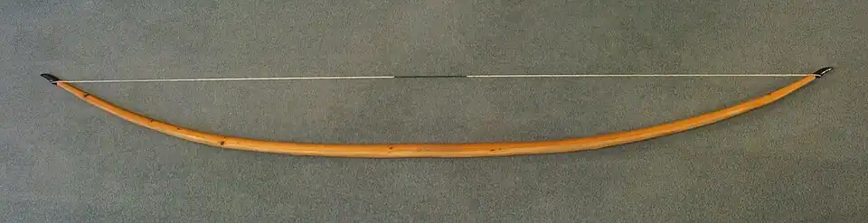 English longbow made of yew. It is 6&nbsp;feet 6&nbsp;inches (1.98&nbsp;m) long with a draw force of 110 pounds-force (470&nbsp;N).