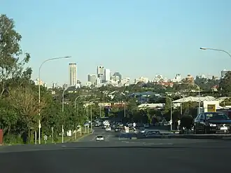 Enoggera Road, with view of Brisbane CBD.