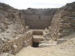 A Descending passage in the midst of ruined walls