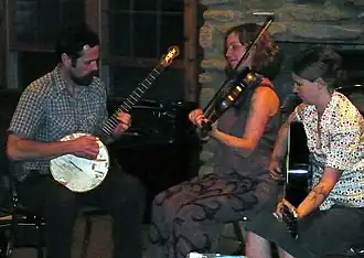 Marshall (center), fiddling with The Haints Old Time Stringband in 2009