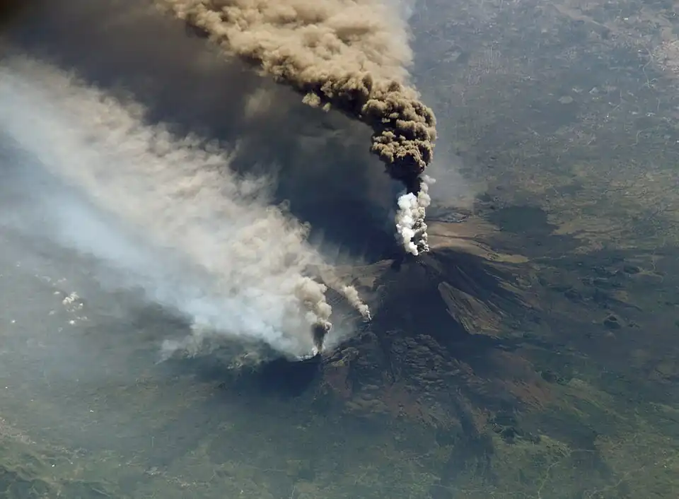 Image 22An October 2002 eruption of Mount Etna, a volcano on the Italian island of Sicily, as seen from the International Space Station. Etna is the largest of Italy's three active volcanoes and one of the most active in the whole entire world. This eruption, one of Etna's most vigorous in years, was triggered by a series of earthquakes. Ashfall was reported as far away as Libya, 600 km (373 mi) to the south. (Credit: Expedition 5 crew.) (from Portal:Earth sciences/Selected pictures)