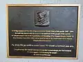 Plaque to Fr. Eugene Kennedy on the wall of St. Thomas the Apostle church