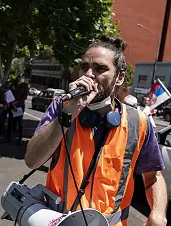 Ox performing at an anti-fascist rally in Melbourne in 2021