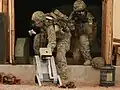 Note the Xbox 360 controller held by the operator