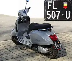 Motorcycle dealer license plate.