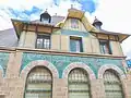 Post office facade with mosaic from Isidore Odorico