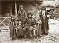 Georgian poet and writer Vazha-Pshavela (centre) wearing a Georgian papakha with his family