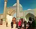 Empress Farah visiting the shrine in December 1974