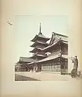 Tennonji, Osaka, between 1885 and 1890. Hand-coloured albumen print on a decorated album page. View of Shitennō-ji, Osaka