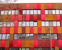 BioCube Building: Façade in different shades of red