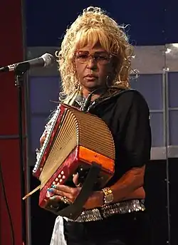 Cabrera playing the accordion