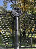 The engraved fence surrounding the complex. Engraved with a picture of Sputnik 1