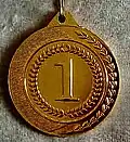 Obverse of the gold medal, awarded in the moremovers section (2023).