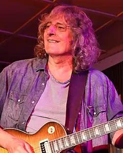 Griglák performing with Prúdy in 2018